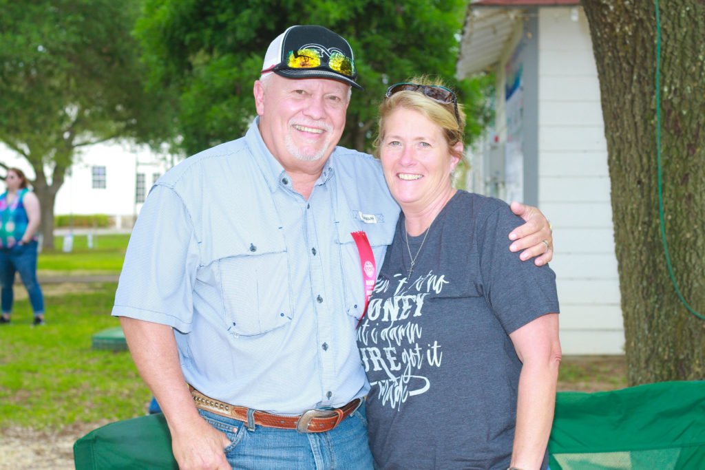 Master-Carpenter, Larry Birkelbach and Abby Birkelbach listen to live music