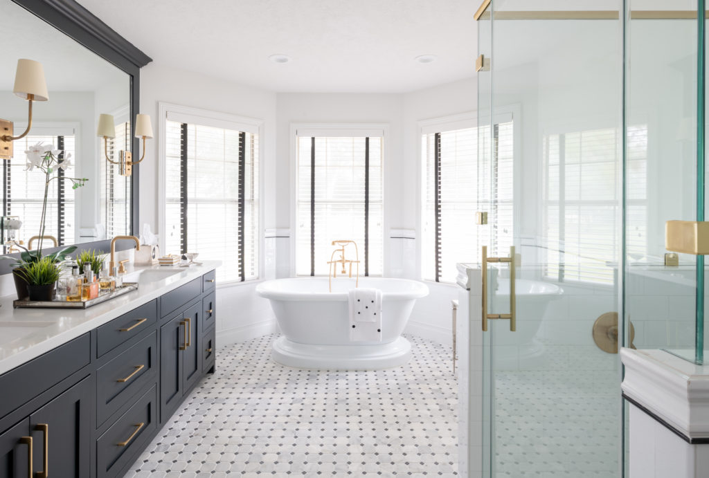 The charcoal-and-gray tile in the master bath is from The Tile Shop. Kohler tub. (Photo Jack Thompson.)
