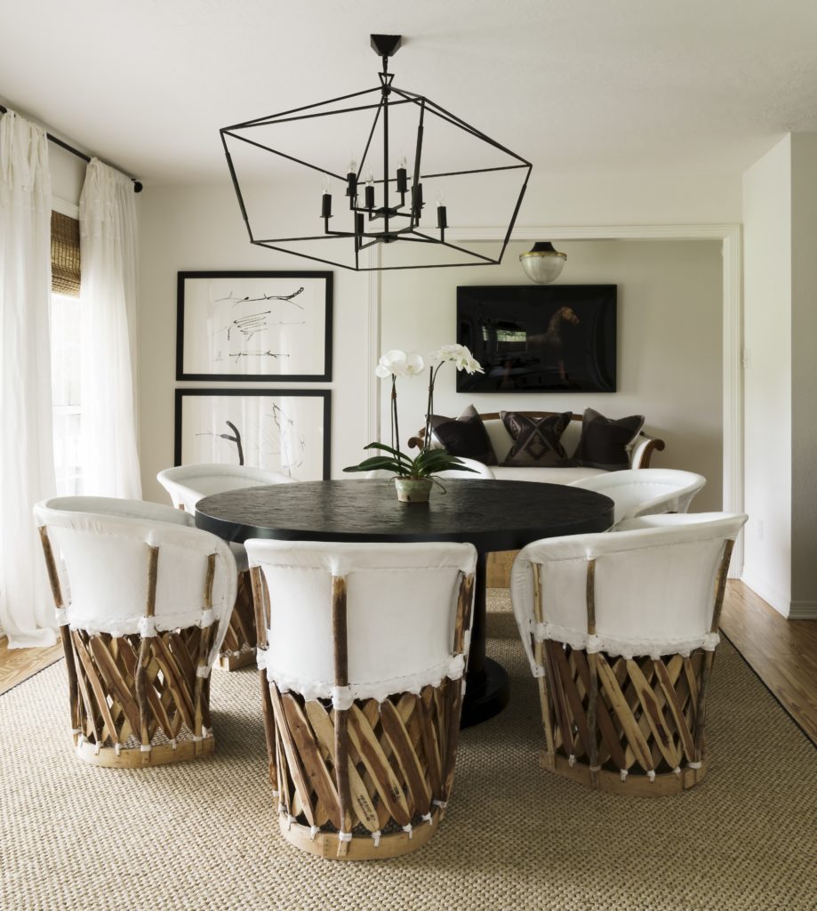 Abbott discovered the dining room’s equipale chairs, made from white pigskin and cedar strips, on the sidewalk of a shop on South Congress Avenue in Austin. Light fixture and table from Shabby Slips. (Photo Jack Thompson.)