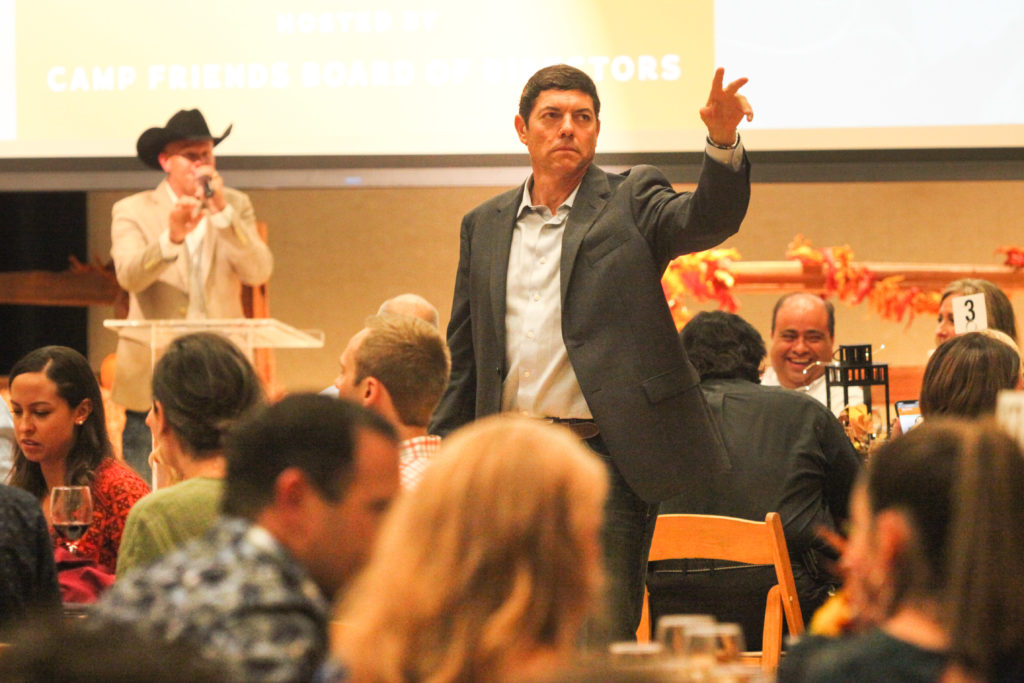 Auctioneers with Nick Hinze work the crowd.