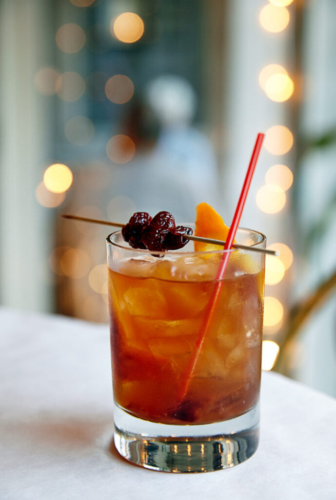 Winter Show – Blade and Bow Kentucky Straight Bourbon Whiskey pouring in the Garden and Gun pop-up.