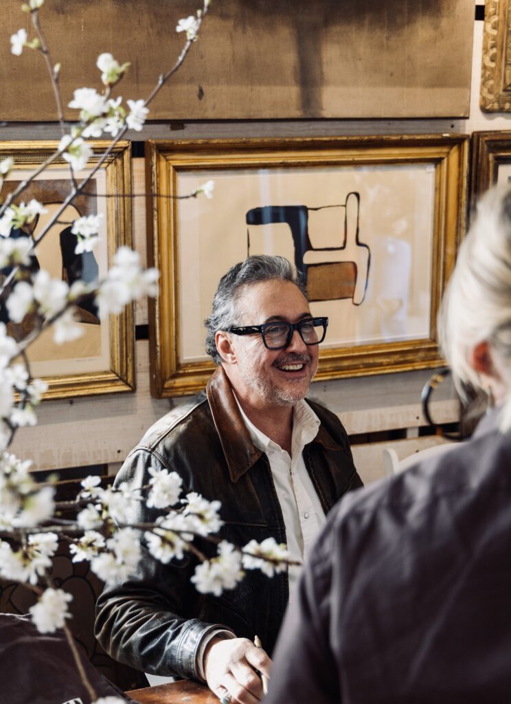 Alfredo Paredes at book signing at dinnerParty showroom
